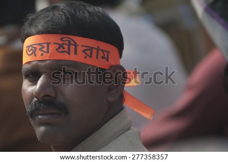 KOLKATA -DECEMBER 20: A supporter wearing Jai Sri Ram means \