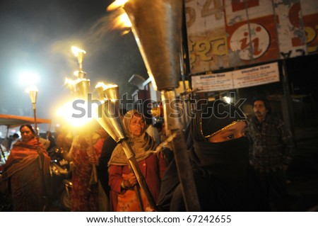 BHOPAL- DECEMBER 2: A part of the  torch rally, organized to pay homage to the victims of Bhopal gas disaster, in Bhopal - India on December 2, 2010.