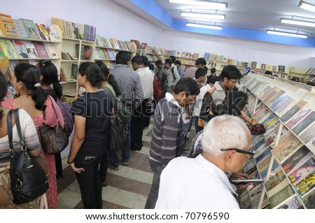 KOLKATA- FEBRUARY 4: Crowd of all ages at the stall of Ananda Publisher  during the 2011 Kolkata Book fair  in Kolkata, India on February 4, 2011.