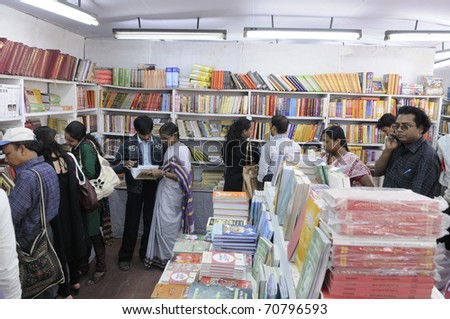 KOLKATA- FEBRUARY 4: People flock inside a book stall  during the 2011 Kolkata Book fair  in Kolkata, India on February 4, 2011.