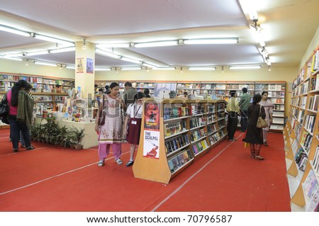 KOLKATA- FEBRUARY 4: Book buyers in search of their favorite books inside a spacious book stall  during the 2011 Kolkata Book fair, in Kolkata, India on February 4, 2011.