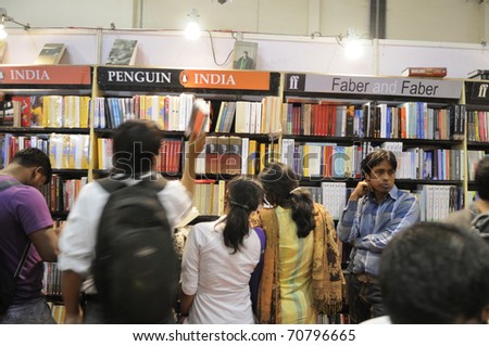 KOLKATA- FEBRUARY 4: Busy book readers at the Penguin India book stall during the 2011 Kolkata Book Fair in Kolkata, India on February 4, 2011.