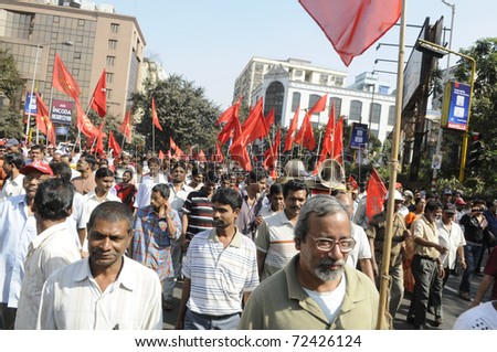 KOLKATA- FEBRUARY 13: Peaceful supporters walk in the rally during a political rally  in Kolkata, India on February 13, 2011.