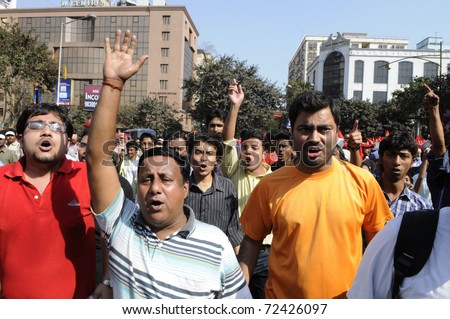 KOLKATA- FEBRUARY 13:   Young adults participate in  a political rally  in Kolkata, India on February 13, 2011.