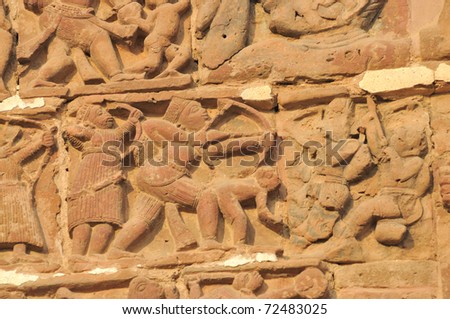 The Radha Gobinodo temple in Jaydev -Kenduli in Birbhum District of the West Bengal State in India has exquisite terracotta carvings. This part of the temple shows a war scene with bows and arrows.