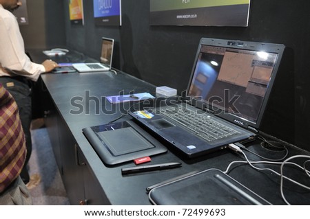 KOLKATA- FEBRUARY 20:  A Bamboo pen & multi-touch pad at display during the Information and Communication Technology (ICT) conference and exhibition in Kolkata, India on February 20, 2011.