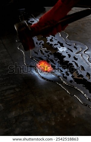 Similar – Image, Stock Photo Blacksmith hand heating metal in oven
