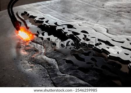 Similar – Image, Stock Photo Blacksmith hand heating metal in oven