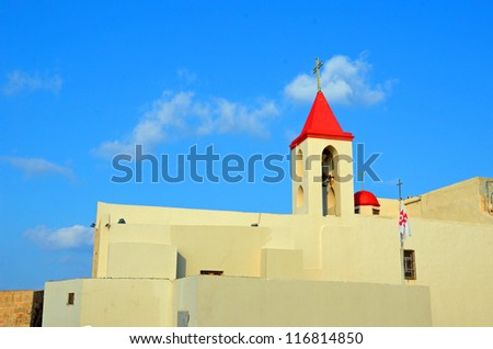 AKKO, ISRAEL-OCTOBER 3: St John\'s Church facade on October 3, 2012 in Akko, Israel. St John\'s Church is located on the south side of the old city and the only active Latin Catholic church in Akko.