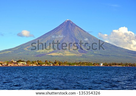 Mayon Volcano in Legazpi, Philippines. Mayon Volcano is an active volcano and rising 2462 meters from the shores of the Gulf of Albay.