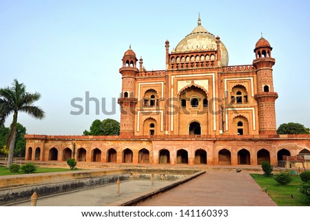 NEW DELHI - MAY 20: Safdarjung\'s tomb facade on May 20, 2013 in New Delhi. Safdarjung\'s Tomb is a garden tomb which was built in 1754 in the late Mughal Empire style.