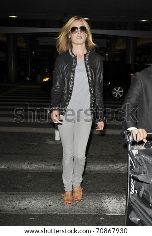 LOS ANGELES-AUGUST 25: Television host Cat Deely is seen at LAX . August 25, 2010 in Los Angeles, California.