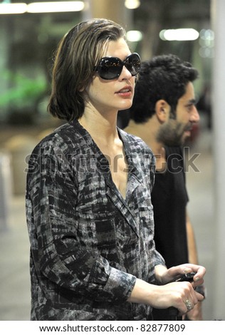 LOS ANGELES-MARCH 31: Actress Milla Jovovich at LAX airport. March 31, 2011 in Los Angeles, California