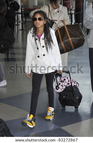LOS ANGELES-APRIL 8: Famous sibling daughter of actor Will Smith singer Willow Smith at LAX airport. April 8 in Los Angeles, California 2011