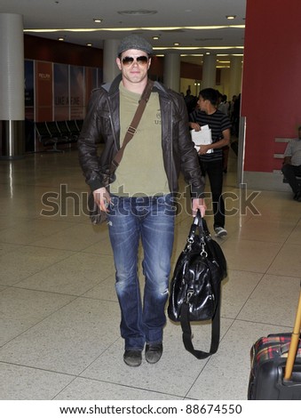 LOS ANGELES-MARCH 14: Twilight actor Kellan Lutz at LAX airport. March 14 in Los Angeles, California 2011