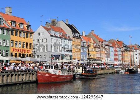 COPENHAGEN, DENMARK - JUNE 5: Crowds gather at Nyhavn, the landmark medieval port and bar district, on June 5, 2010 to celebrate the anniversary of Constitution Day in Copenhagen, Denmark.