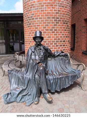 ODENSE, DENMARK - JUNE 3: Statue of Hans Christian Andersen  on June 3, 2010 in Odense, Denmark.  Anderson was born in Odense and is the famous writer best remembered for his fairy tales.