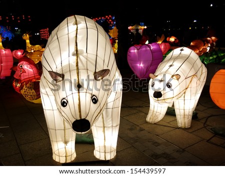 HONG KONG, CHINA - SEPTEMBER 16: Chinese lanterns light up to celebrate the mid-autumn festival, also known as moon festival, on September 16, 2013 in Hong Kong, China.