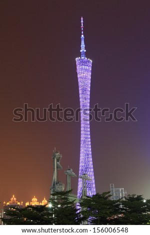 GUANGZHOU, CHINA - AUGUST 10: Guangzhou Tower lights up for celebrating the 108th Canton Fair on August 10, 2012 in Guangzhou, China.