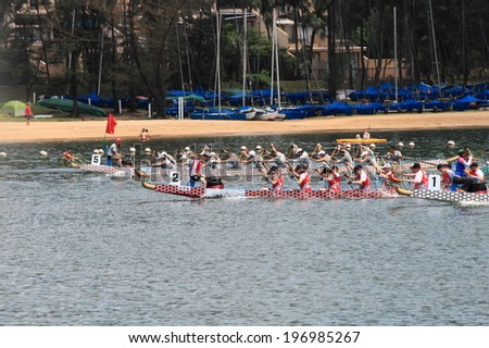 HONG KONG - JUNE 1, 2014: Unidentified teams compete at the 2014 Dragon Boat Race to celebrate the Tuen Ng festival at Discovery bay on June 1, 2014 in Hong Kong.
