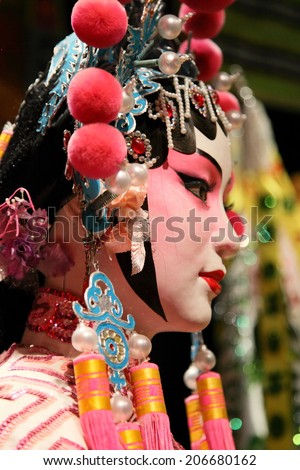 HONG KONG - JUNE 27, 2014 : Cantonese opera dummy with traditional makeup on June 27, 2014 in Hong Kong. Originating in southern China, Cantonese opera is a popular theatrical art in Hong Kong.