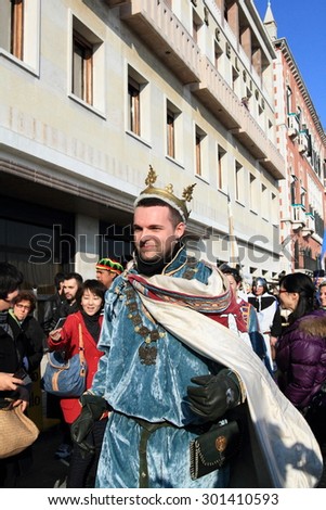 VENICE, ITALY - FEBRUARY 26: Venetian man in medieval costumes greets visitors at the 2011 Venice Carnival celebration event at Saint Mark Square on February 26, 2011 in Venice, Italy.