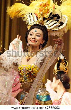XIAN, CHINA - FEBRUARY 21: Chinese female dancer performs traditional Tang dynasty dance onstage at Xian Theater on February 21, 2006 in Xian, China