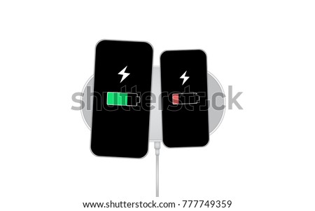 Two Smart Phone on Big Modern Wireless Charging Station with cable.