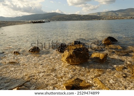 Similar – Foto Bild Steiniges Ufer bei ruhigem See