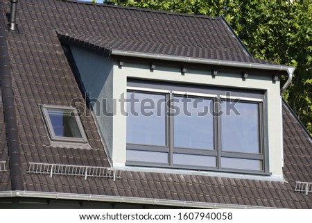 Large dormer on a newly tiled roof Stock foto © 