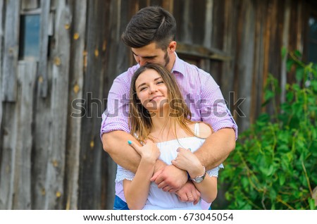 girl hugging guy from behind girl hugging guy from behind