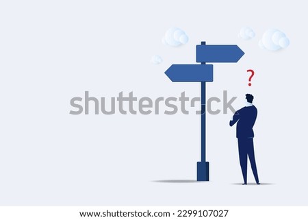 Choosing between 2 choices, make decision to the left or right, thinking in difficult situation, confusion concept, businessman thinking with question mark choose between 2 direction with copy space.