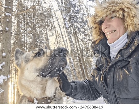 Similar – Image, Stock Photo White shepherd dog taking a bath