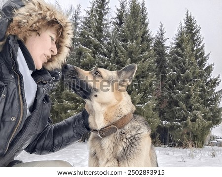 Similar – Image, Stock Photo White shepherd dog taking a bath