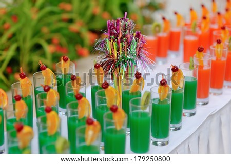 buffet banquet table colorful drinks on a long white table