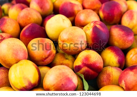 Bunch of fresh peaches background