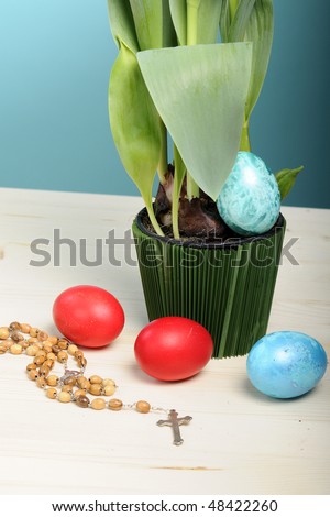 easter eggs and religious cross for easter celebration