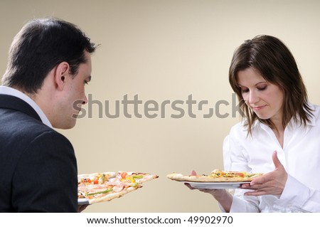 man and woman evaluating food
