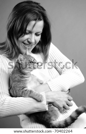 cat and woman expressing friendship
