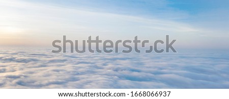 Yellow and blue dawn over clouds, concept, travel and leisure. ストックフォト © 