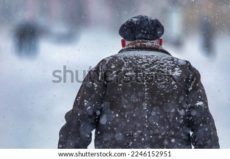 Similar – Image, Stock Photo Woman in heavy snowfall in the park