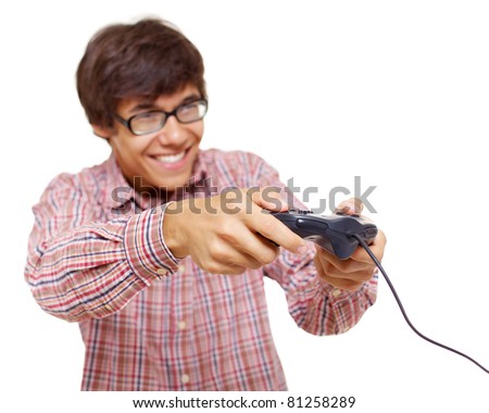 Happy young man in glasses playing video game with joystick over isolated background, focus on joystick. Mask included