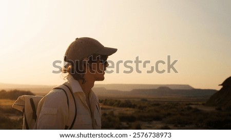 Similar – Image, Stock Photo Male traveler in Bardenas Reales in summer