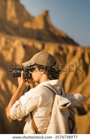 Similar – Image, Stock Photo Male traveler in Bardenas Reales in summer