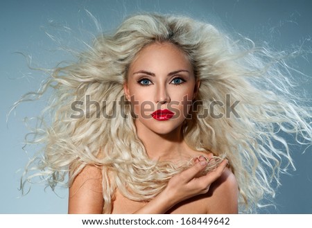 beautiful blonde woman  with perfect curly hair