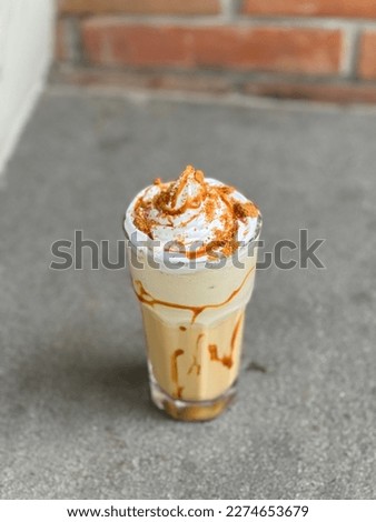 Similar – Image, Stock Photo Salted caramel frappe coffee served on glass