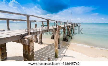 Wooden bridge into the sea.One of the most beautiful and most popular beaches at ao Noina on Koh Samet.Crystal Sand Beach at Samet Island