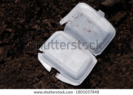 Similar – Image, Stock Photo Styrofoam box with food from snack bar on shimmering satin bed sheet