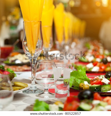 Similar – Image, Stock Photo Served banquet table with elegant decorations and plates with cutlery