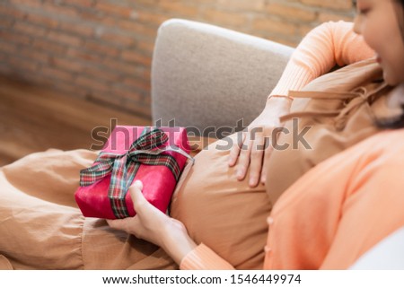 Similar – Image, Stock Photo Surprised newborn girl while relax in her hammock